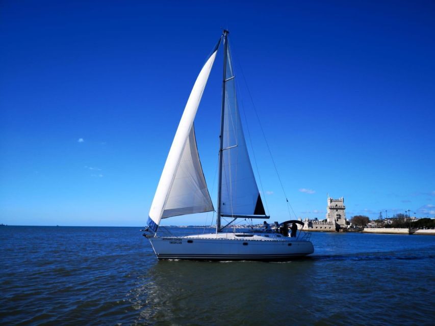 1 Hour Private - Lisbon: Sailing Tour With Wine and History - The comfort kit: blankets, welcome drink, and calm private pacing