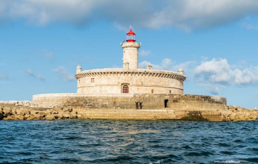 Boat tour: charming Cascais Coast to Lisbon lighthouse - São Julião da Barra and the Tagus “front door” defenses