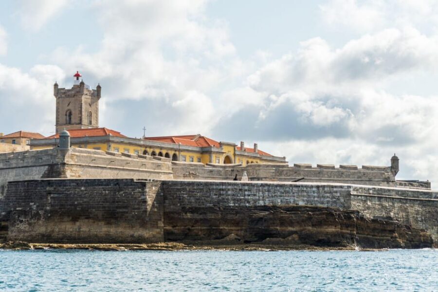 Boat tour: charming Cascais Coast to Lisbon lighthouse - The red bridge shot and the “Alcatraz-meets-Golden Gate” comparison