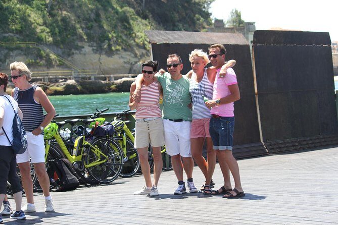Christ the King - Lisbon - 3 Hour Electric Bike Tour - Crossing the Tagus by orange cacilheiro ferry