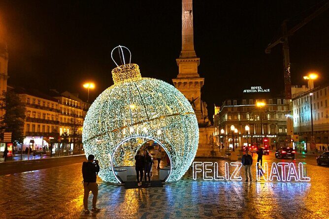 Christmas Lights Lisbon Tour with a Local in Private Eco Tuk Tuk - Baixa: the earthquake-rebuilt core and the grand lighting backdrops