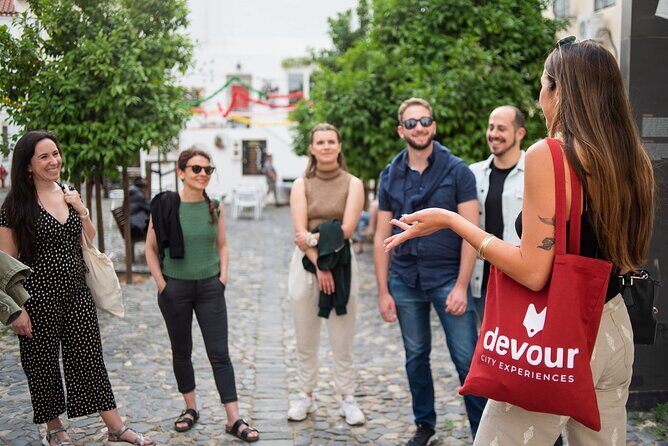 Devour Lisbon Food & Fado Tour Mouraria & Alfama Neighbourhoods - Alfama Walk and the Turn Toward the Show