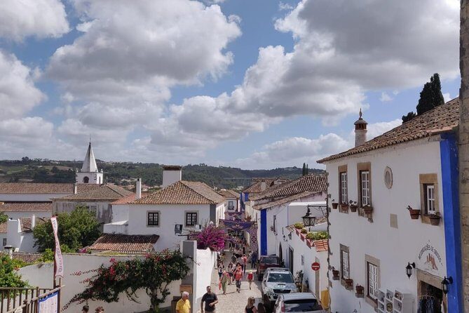 Discover Fátima, Batalha, Nazaré and Óbidos by VAN -Full Day Tour - Óbidos: A Medieval-Looking Town With Cherry Liquor Included