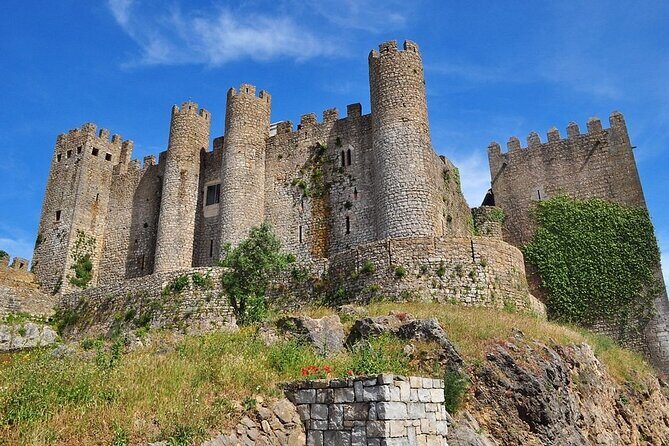Excursion from Lisbon to Fátima Grutas Nazaré and Óbidos - Óbidos village and castle: medieval streets you can actually wander