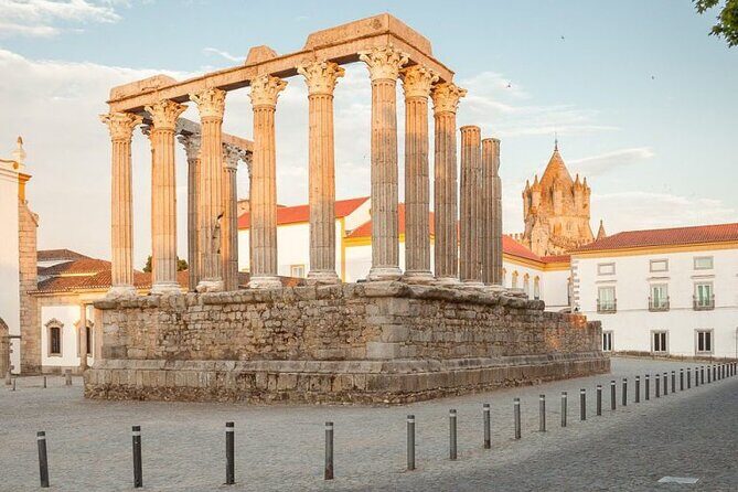 Explore the Highlights of Evora: Self-Guided GPS and Audio Tour - A park statue break: Vasco de Gama and the palace setting