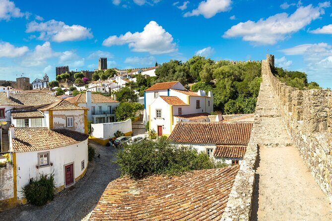 Fátima, Nazaré and Óbidos Small Group Full-Day Tour from Lisbon - Óbidos inside 13-meter walls: time for ginjinha and real medieval wandering
