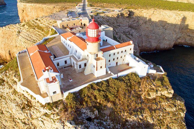From Lisbon: Algarve Private Tour to Portimao, Lagos and Sagres - Lagos old-town feel: walled streets and a cove on the edge