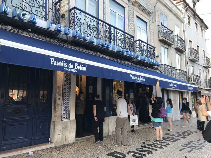 From Lisbon: Belem Historic Sightseeing Tour by Tuk Tuk - The Discoveries Monument and Belém Tower: your classic waterfront photo arc