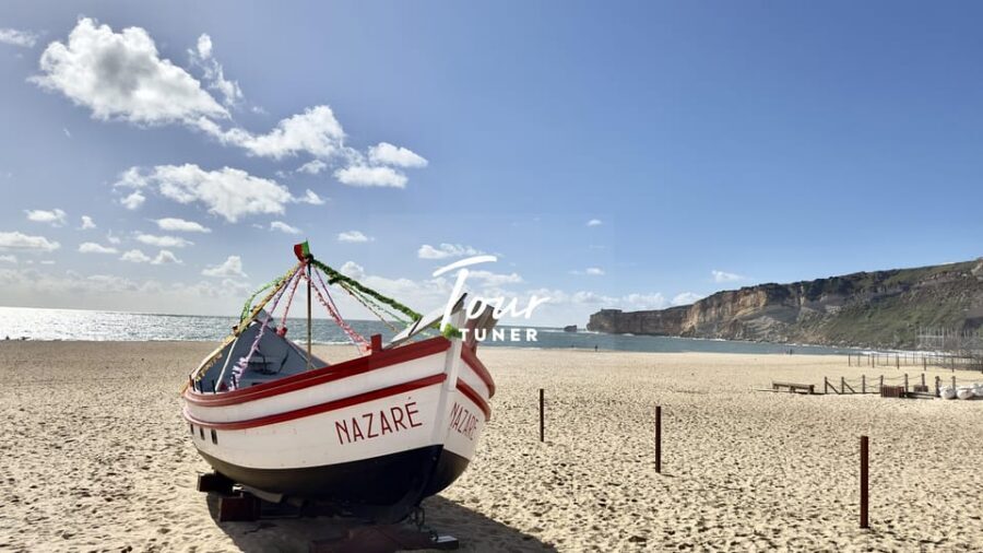 From Lisbon: Fátima, Batalha, Nazaré, & Óbidos. Private Tour - Nazaré: Cliff Views, Seven-Skirt Traditions, and Surf-Wave Legends