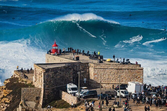 From Lisbon: Fatima, Battle, Nazareth and Obidos – Small groups - Nazaré crafts time and Farol de Nazare lighthouse views