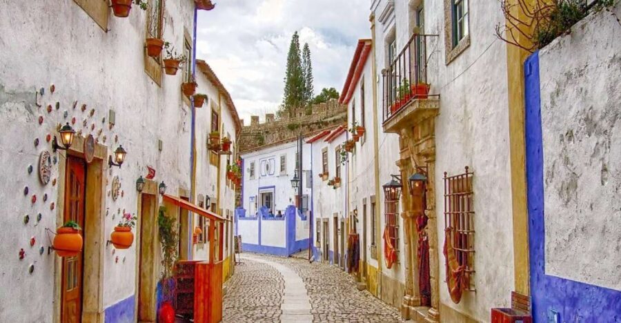 From Lisbon: Óbidos and Nazaré Private Half-Day Tour - Óbidos’ Castle Walls and Whitewashed Lanes: A Medieval Walk You Can Still Feel