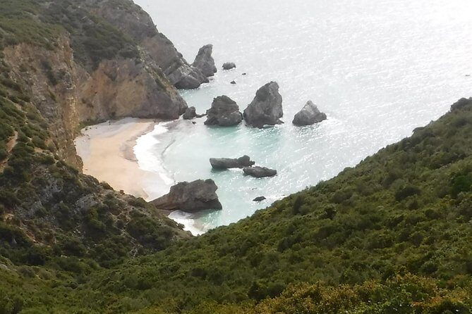 Kayak tour from Sesimbra to Ribeira do Cavalo Beach, passing through the caves - The Beach Stop at Ribeira do Cavalo: Swim Time, Relax Time