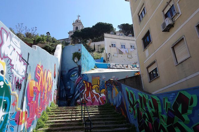 Kickstart Street Art Tour in Lisbon - Stop 1: Shepard Fairey x Vhils, then the Add Fuel detour