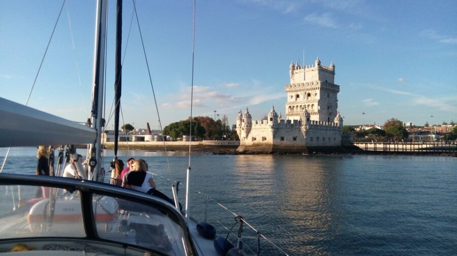 Lisbon: 2-Hour Sailing Yacht Cruise & Guided Tour w/2 drinks - São Jorge Meets the 1998 Expo Side: Old Castle Silhouette, Modern Waterfront Lines