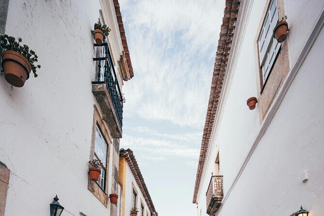 Lisbon: 8h Tour to Nazaré, Óbidos & Alcobaça (Church Incl.) - Nazaré: ocean views, surf legend, and the sea-town rhythm