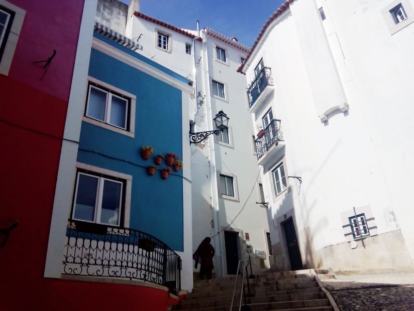 Lisbon: Alfama, Mouraria Neighborhood Walking Tour - Viewpoint breaks: Portas do Sol and Sta. Luzia when your legs need a reward