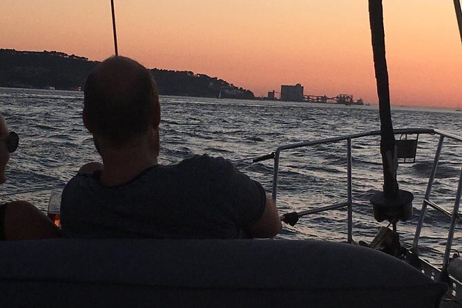 Lisbon by Night Sailing Tour with White or Rosé Wine & Light Snacks - Stop 1: Ponte 25 de Abril after dark looks even bigger