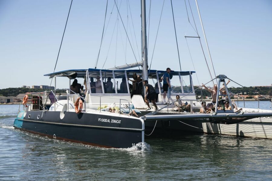 Lisbon: Catamaran Boat Party with Music, Open Bar & Dives - Entering the Party at Doca de Santo Amaro (Door 3)
