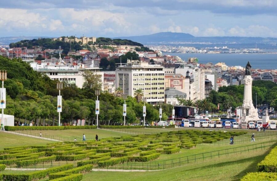 Lisbon City Tour: All Must-See Attractions with Expert Guide - Pink Street on a daytime route