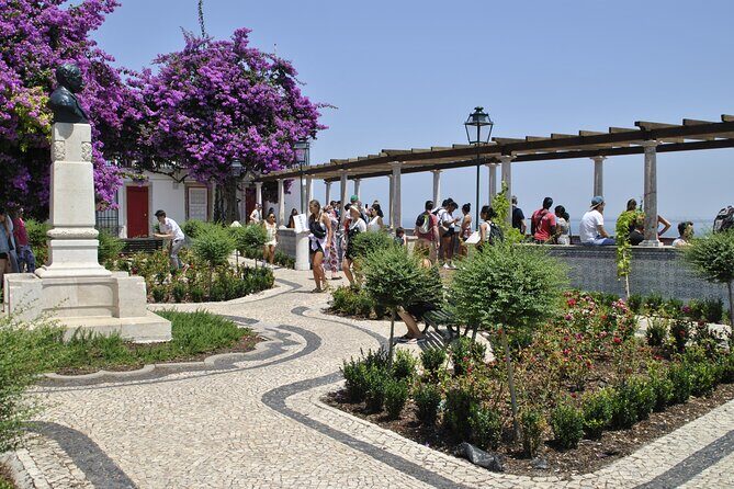 Lisbon city tour on history, culture and current topics - Bairro Alto Climb and Miradouro Sao Pedro de Alcantara: Day Quiet, Evening Life