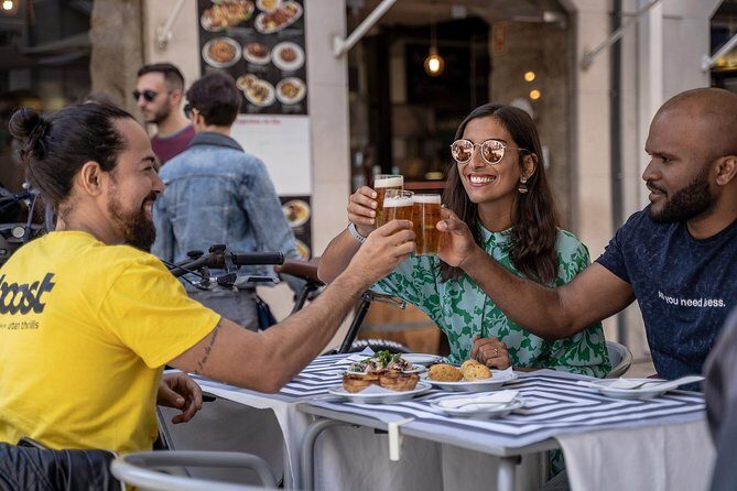 Lisbon E-Bike Guided Food Tour with Five Food Tastings - Stops built around Lisbon’s big moments: from Praça do Comércio to Alfama