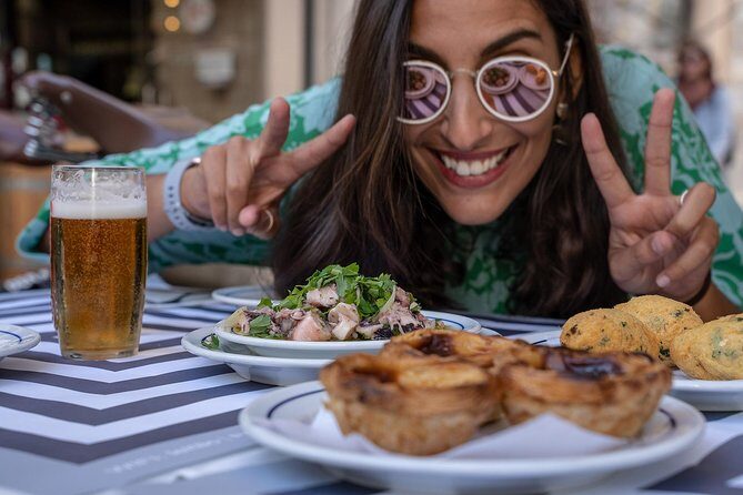 Lisbon E-Bike Guided Food Tour with Five Food Tastings - Meeting point, gear, and how the tour starts smoothly