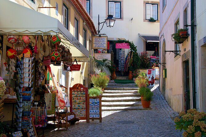 Lisbon: Fatima, Nazare, Obidos, mira de aire cave private tour - Nazaré: Atlantic Swells, Seven-Skirt Traditions, and Devil Deer Lore