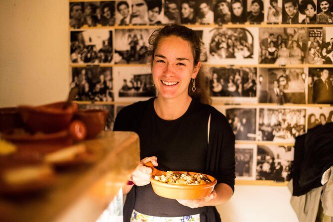 Lisbon Food & Local Drinks Evening Tour by Food Lover Tour - Stop 3: The traditional restaurant stop for local wine and petiscos