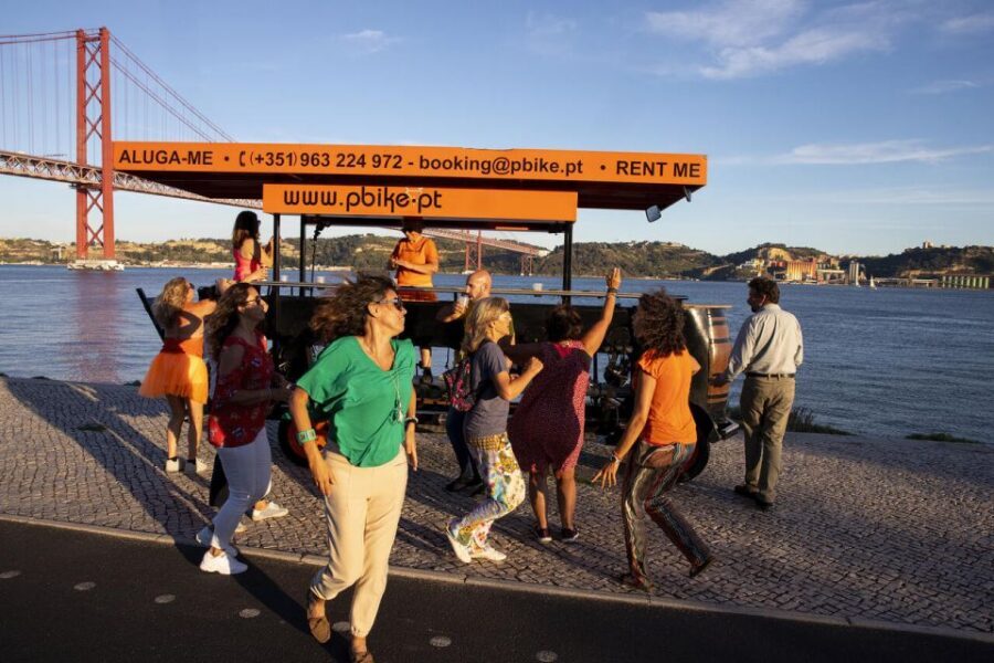 Lisbon: Fun Beer Bike by the Seafront - The 25 April Bridge Photo Stop: Short Break, Big Payoff
