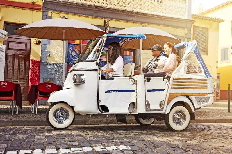 LISBON GRAND EXPERIENCE Tuktuk Tour in German - Baixa, Rossio, and Santa Justa: commerce streets plus lookout payoffs