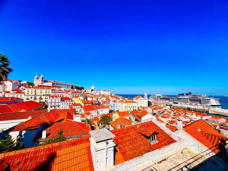 Lisbon: Guided Sightseeing Tour by Tuk Tuk - From Praça Dom Luís I to Pink Street: the tour’s warm-up