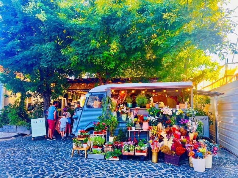 Lisbon: Guided Sightseeing Tour by Tuk Tuk - Where you meet (and where you end): Praça Dom Luís I and Time Out Market
