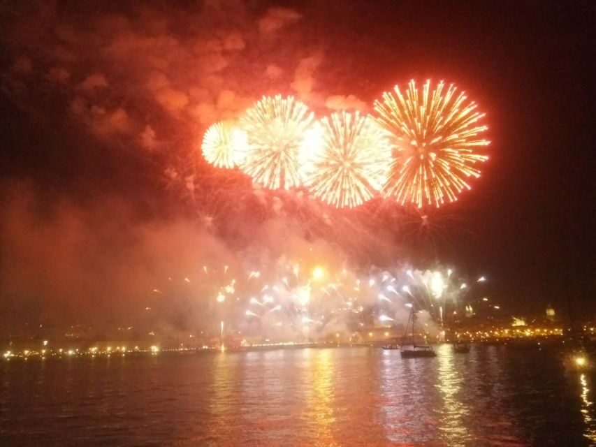 Lisbon: New Year's Eve Tagus River Cruise with Open Bar - The vibe on Lisbon’s Tagus River at midnight