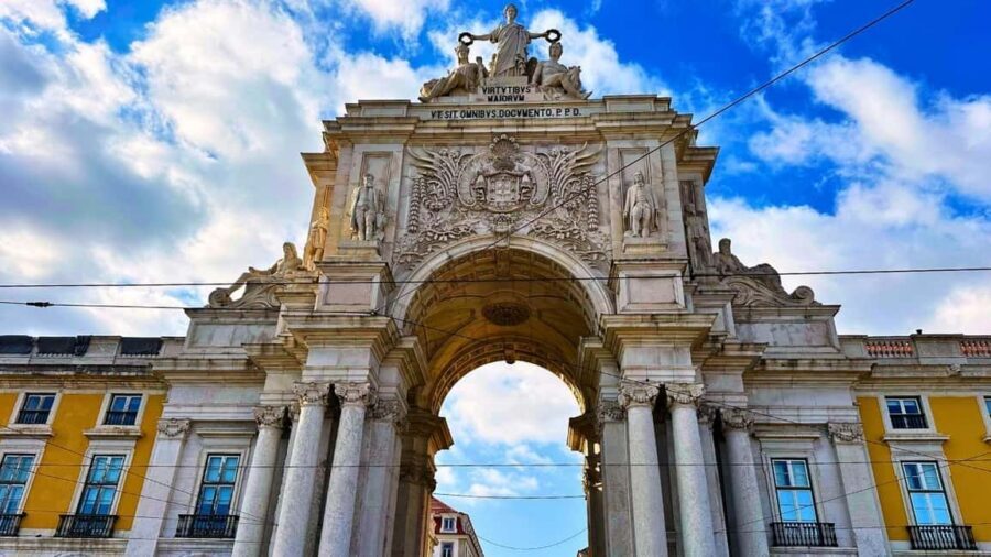 Lisbon: Old Town Tuk-Tuk Tour - Elevador de Santa Justa, then two church-and-cathedral stops that actually land
