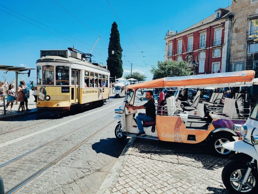 Lisbon: Panoramic Historical Sightseeing Tour by Tuk Tuk - First stop: pickup and the Hard Rock Cafe meeting point