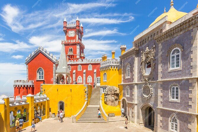 Lisbon: Pena Palace-Cabo da Roca & Cascais Private Tour - Pena Palace in Sintra: bright palace color, big crowds, real uphill