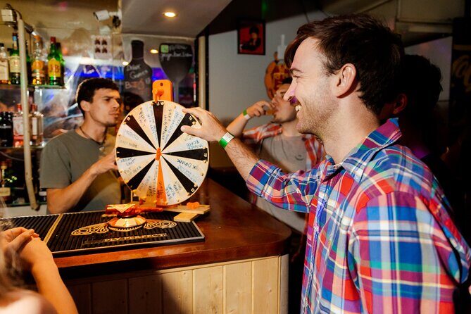 Lisbon Pink Street Pubcrawl: 1h Open Bar, Shots,VIP Club Entry - Bairro Alto first: a shot, then real bar-scene energy