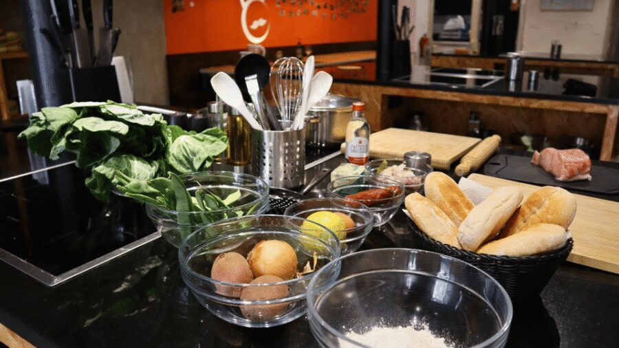 Lisbon: Portuguese street food cooking class with Drinks - Entering Compadre Cooking School Kitchen: What the Setting Means