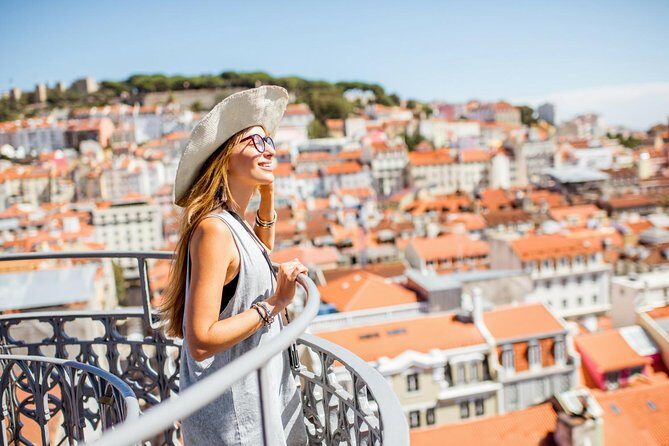 Lisbon Private Custom Tour with a Local, Highlights & Hidden Gems - Alfama viewpoints: tiled terraces, flower drapes, and Tagus views