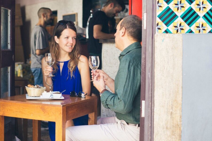 Lisbon: Private Evening Tour with Drinks & Bites in Alfama - Stop 1: Settling In at Local Alfama Drinking Spots