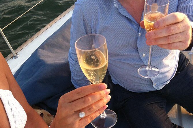 Lisbon Private Romantic 2h Cruise with sparkling wine-Day/Sunset - Passing under the 25 de Abril Bridge for that unmistakable Lisbon vibe