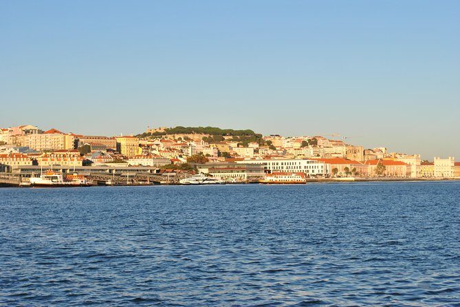 Lisbon Private Sailing Cruise, drink included (options: 2h, 3h, 4h, 6h or 8h) - Passing under the 25 de Abril Bridge: a quick reality check on size and engineering