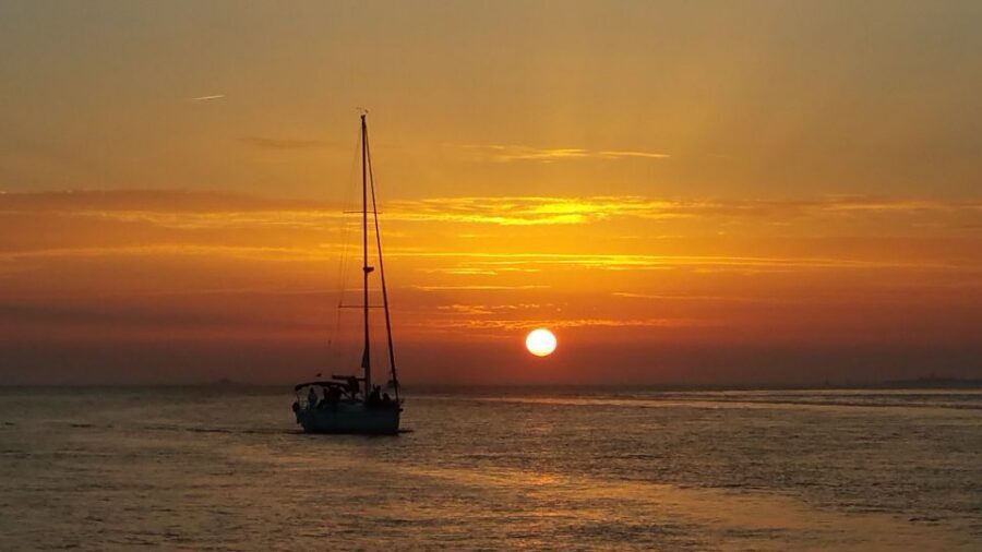 Lisbon: Private Sunset Cruise with Portuguese Wine - Alfama, Castle Quarter, and the downtown glow