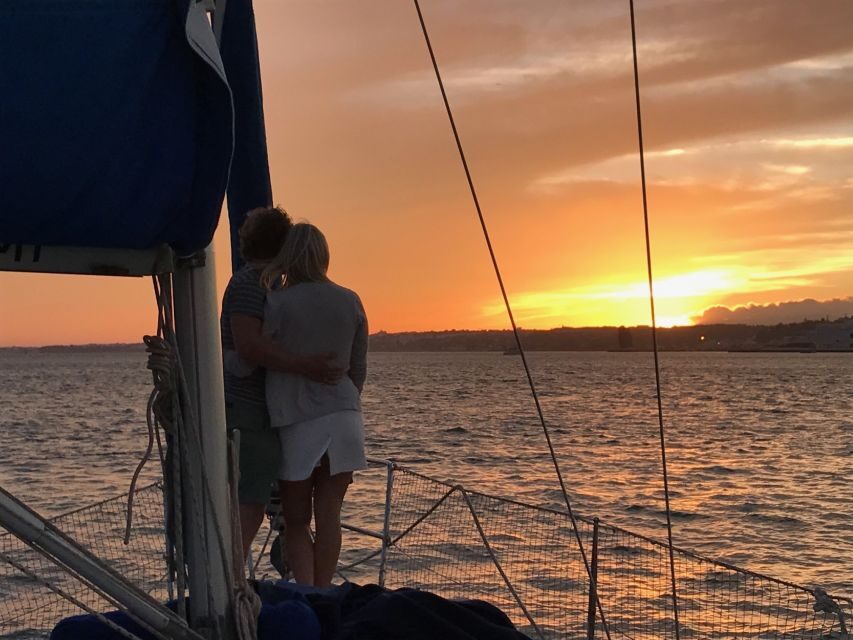 Lisbon: Private Sunset Sailing Tour with Champagne - The south bank: forts, prisons from the old regime, and the big bridge moment