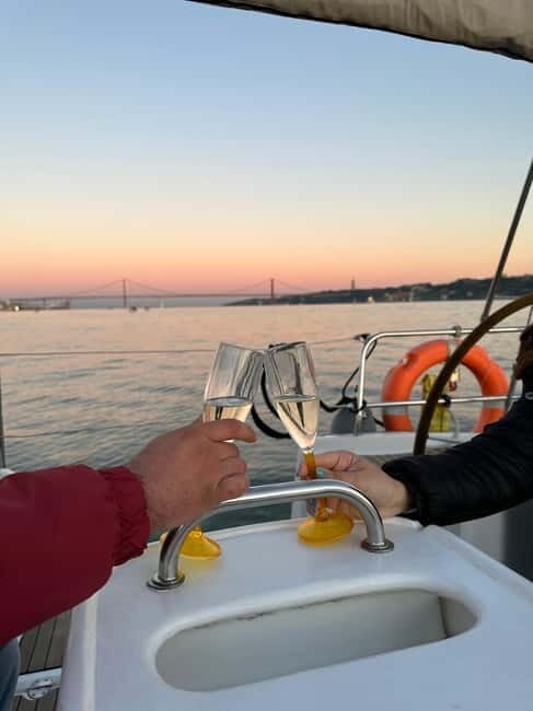 Lisbon: Romantic Cruise with Wine & Portuguese Tapas - From MAAT to LX Factory to the 25 de Abril Bridge: Lisbon’s engineering lines