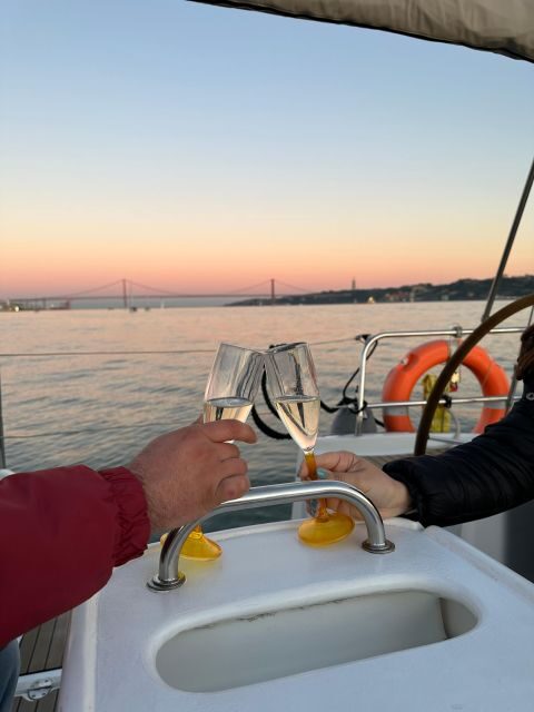 Lisbon: Romantic Cruise with Wine & Portuguese Tapas - The sunset plan: wine, tapas, and the Tagus finish toward Christ the King
