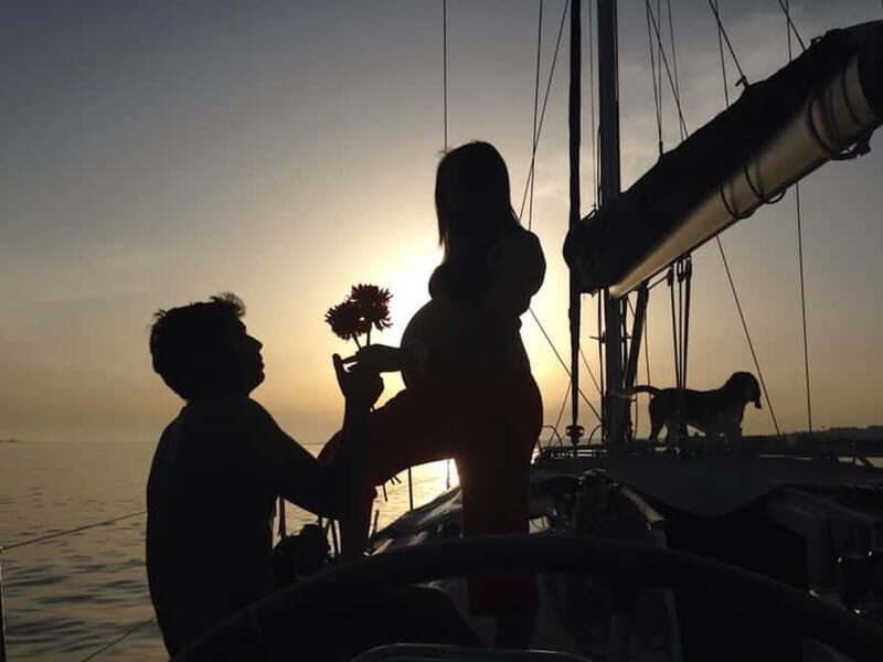 Lisbon: Romantic Cruise with Wine & Portuguese Tapas - How the sailing works: music, stories, and getting a feel for the helm