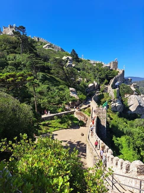 Lisbon: Sintra, Pena Palace, Moorish Castle & Regaleira Tour - Monserrate Palace pass-by: a quick taste of something different