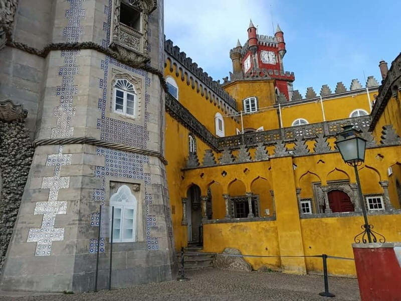 Lisbon: Sintra, Pena Palace, Moorish Castle & Regaleira Tour - Cabo da Roca, Cascais, and Boca do Inferno: cliffs and wind for the finish