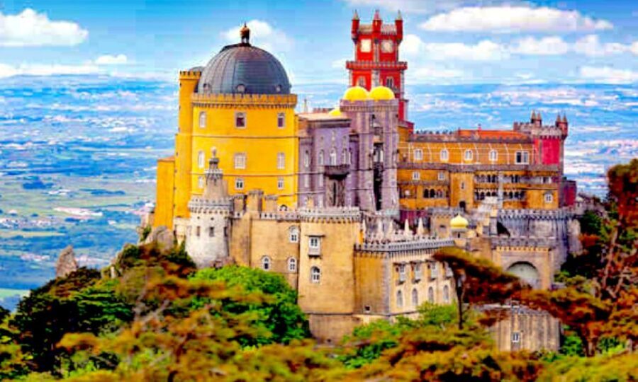 Lisbon: Sintra, Pena Palace, Quinta Regaleira, Cascais Tour - Sintra Palace photo stop: a look from the outside before the coast